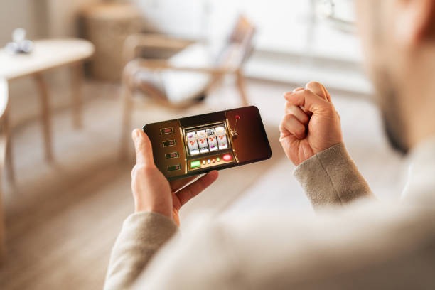 gacoanbet app showing live football matches and casino game selection